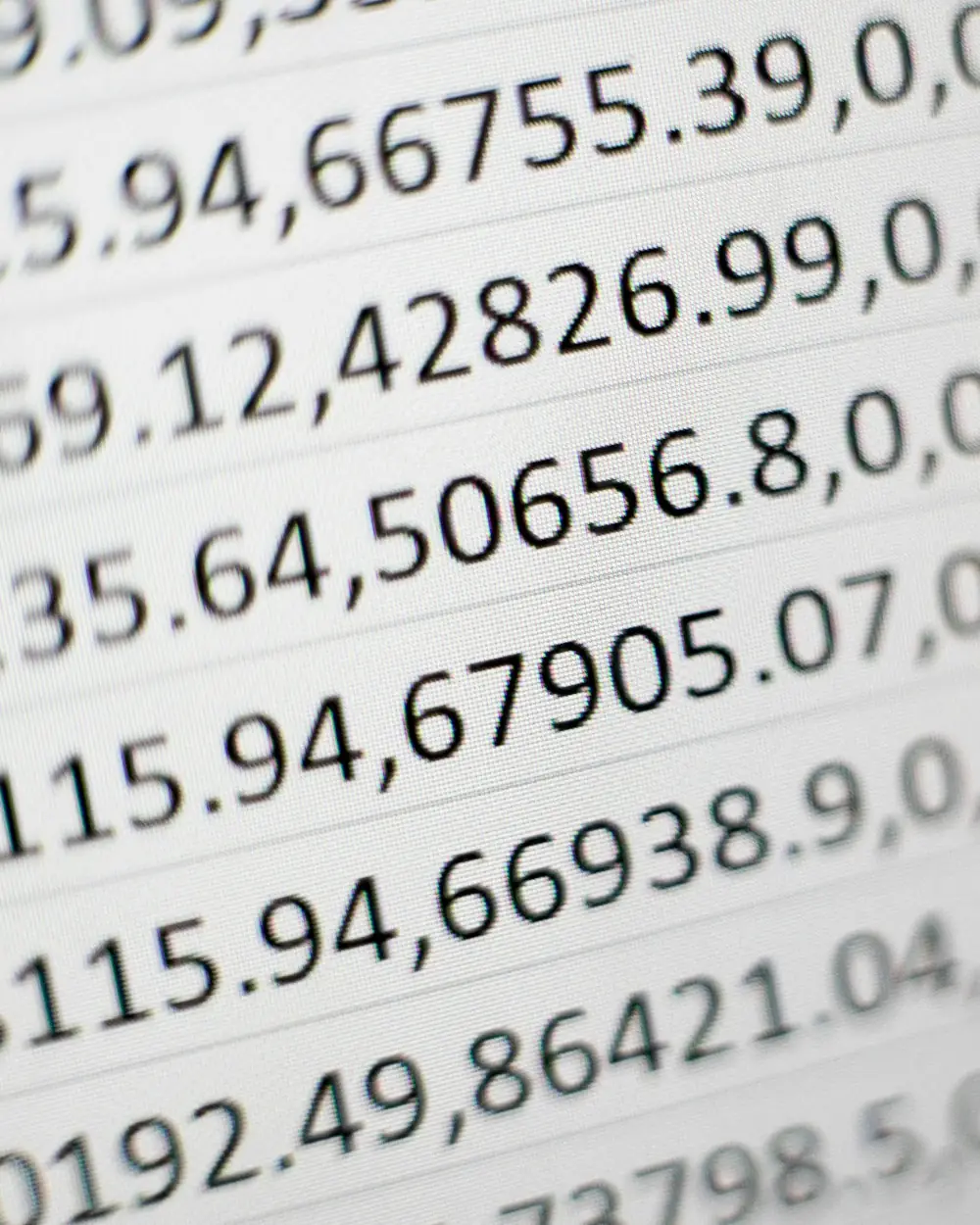 Rows of figures on a screen, photographed close up.